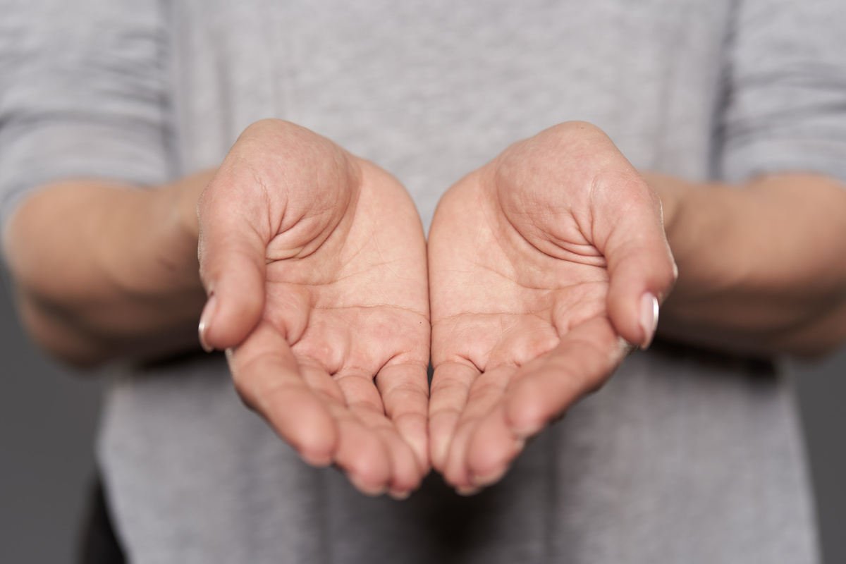 Woman's Hands Offering Support